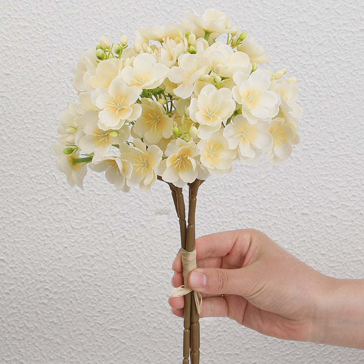 Artificial flower bouquet with delicate blooms