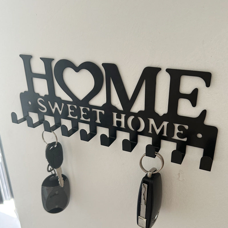 Wall coat rack with heart motif