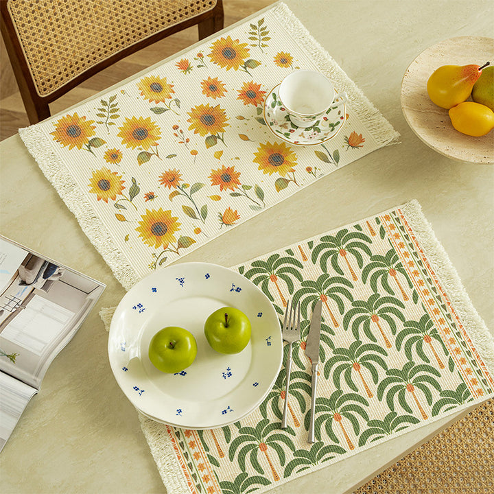 Rectangular woven rug in tropical palm pattern with flat weave and fringes