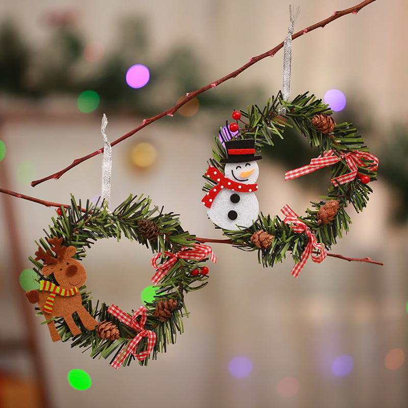 Festive Pine Cone Wreath with Reindeer Decoration