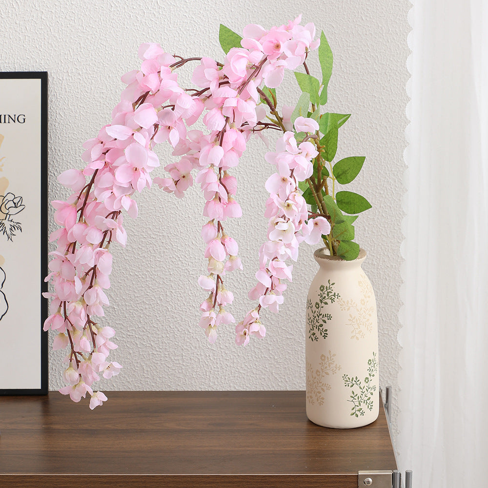 Artificial flower branch with elegant flowers