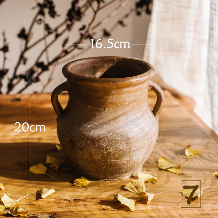 Rustic ceramic pot with handmade design