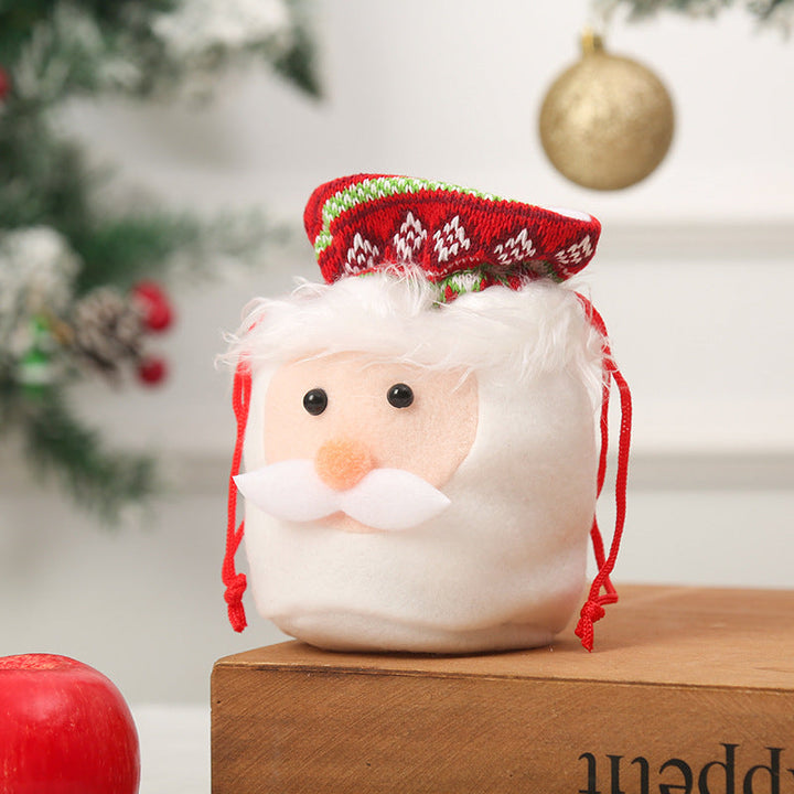 Cute Christmas gnome with gift sack