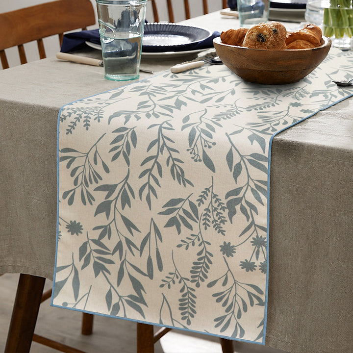 Woven table runner and placemat set made of cotton-linen with botanical scrolling pattern