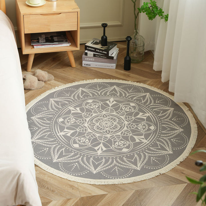 Round woven rug with mandala motif, flat cotton-jute mix and fringes