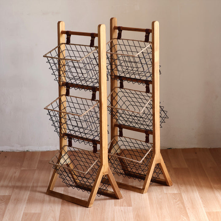 High-quality storage tower made of wood with metal baskets