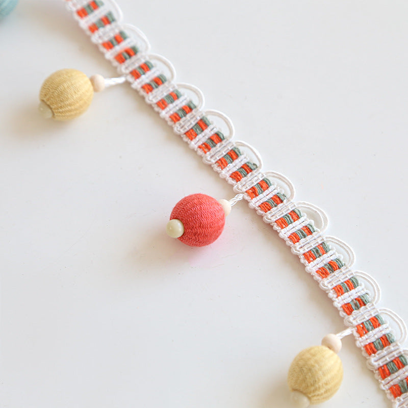Decorative fringe trim with colorful tassels