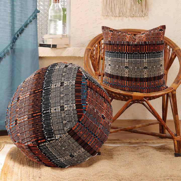 Round woven seat pouf made of durable cotton mix with practical carrying handle