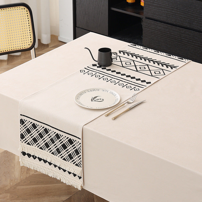 Woven table runner in Boho style with fringes and geometric ethnic print