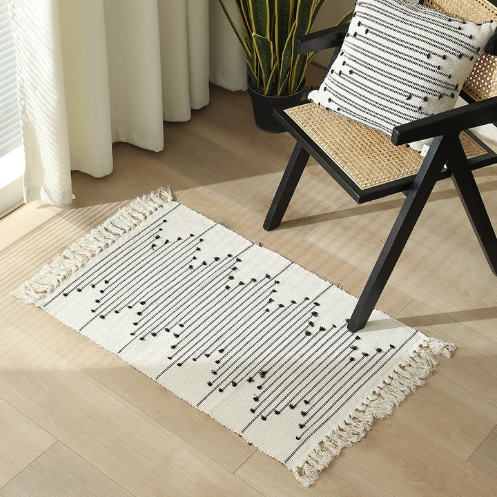 Cotton runner rug with fringes and geometric texture pattern