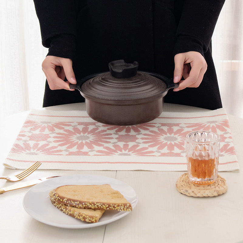 Woven placemat made of cotton blend with geometric diamond trim and fine texture