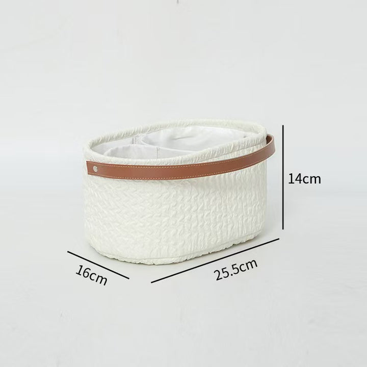 Elegant storage basket with faux leather handle