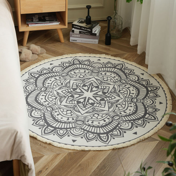 Round woven rug with mandala motif, flat cotton-jute mix and fringes