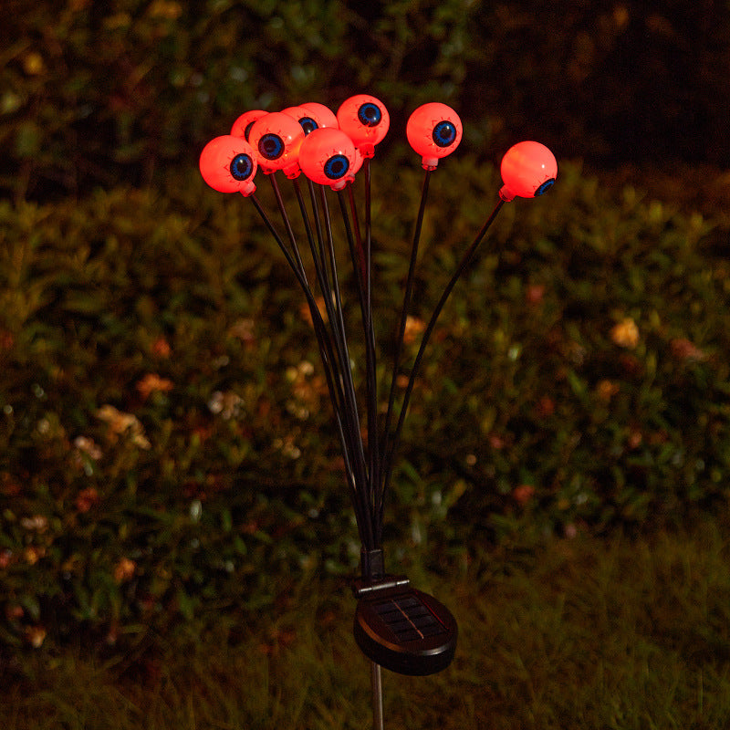 Creepy garden lights with eye motif