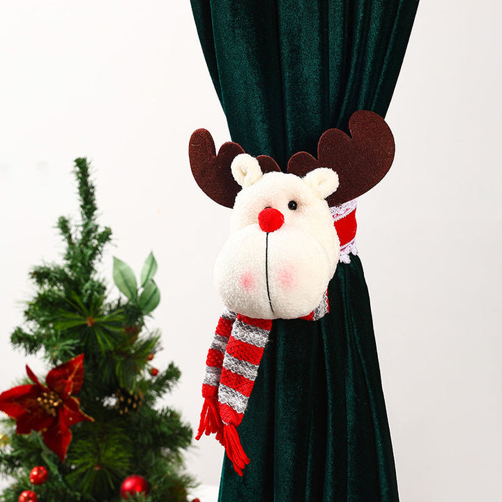 Decorative curtain holder with Christmas moose motif