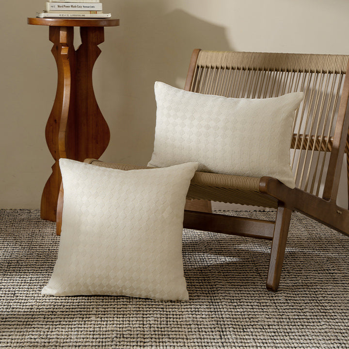 Woven decorative cushion cover with textured diamond relief surface