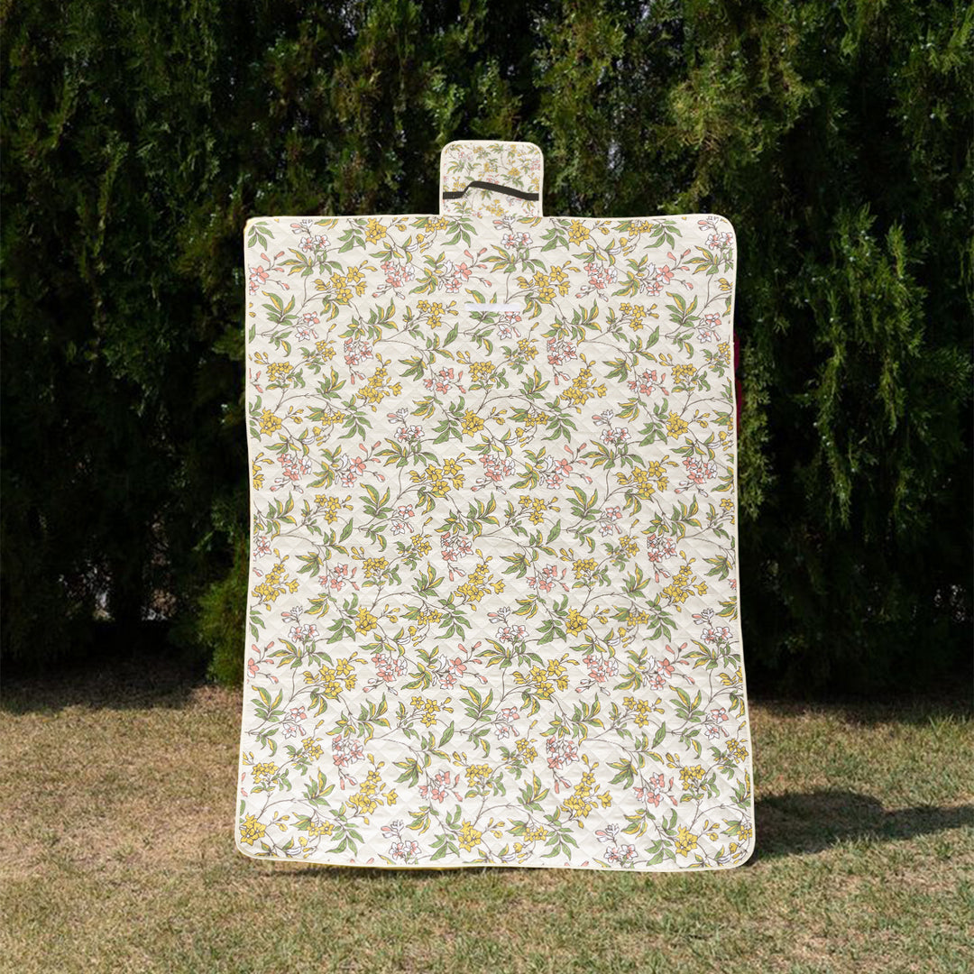 Quilted picnic and beach blanket set with carrying strap and water-repellent back