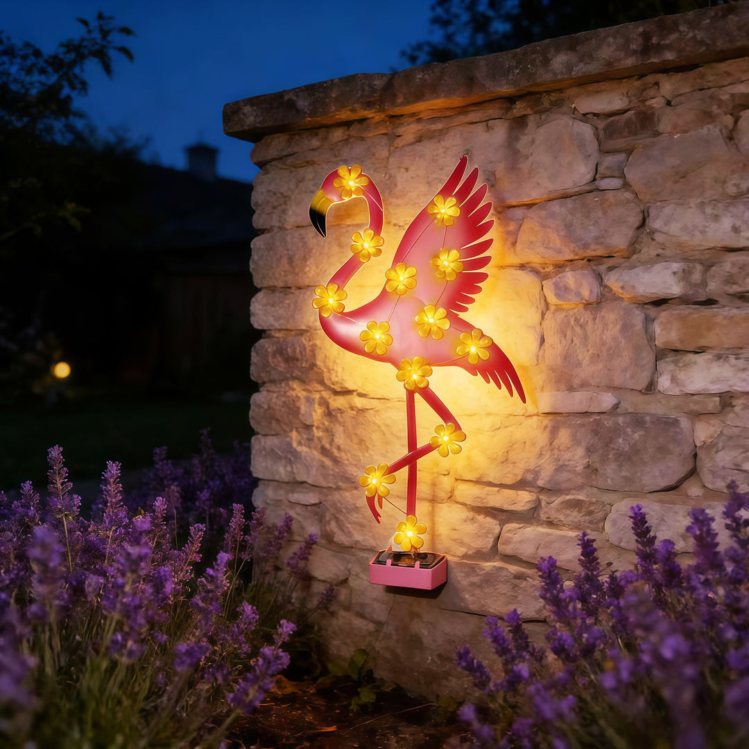 Solar-powered Flamingo LED garden stake light with flower accent lamps