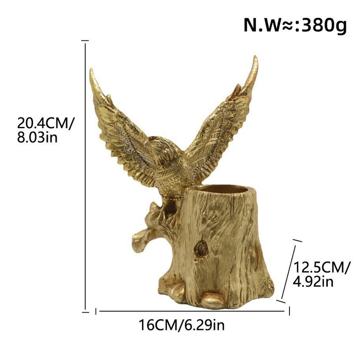 Elegant garden figure with eagle on tree trunk
