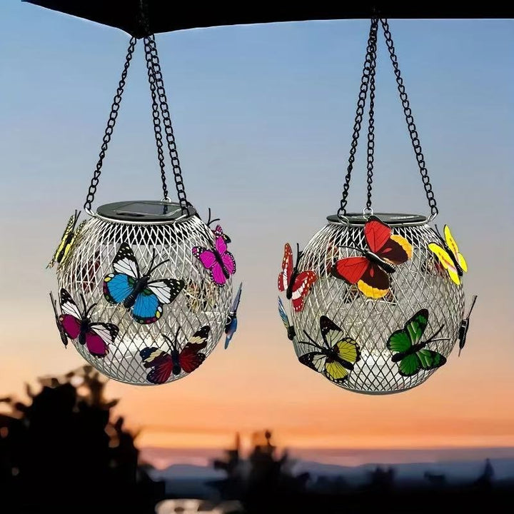 Weatherproof hanging solar LED lanterns for outdoor use with metal cage, warm glass, and hanging chain