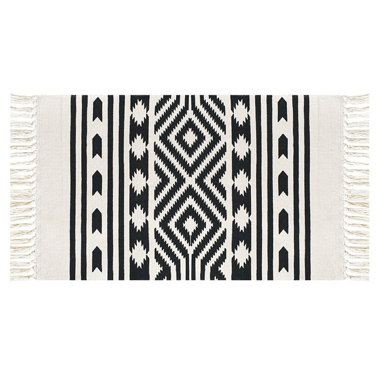 Flat-woven cotton runner with Mediterranean tile jacquard and decorative fringes