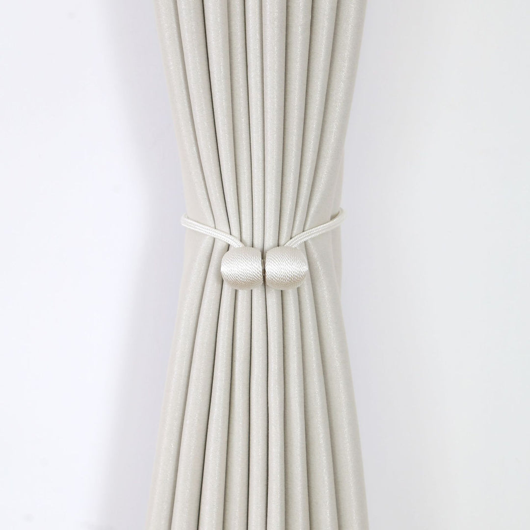 Decorative curtain tieback