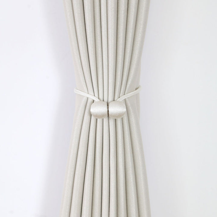 Decorative curtain tieback