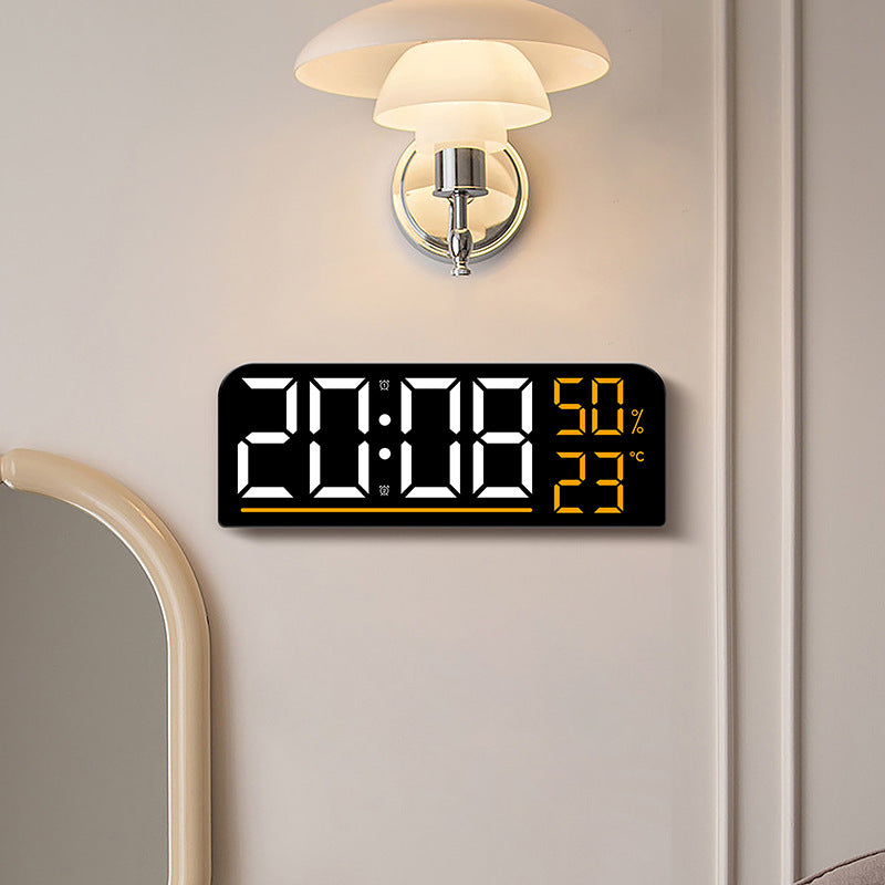 Digital alarm clock with hygrometer and temperature display
