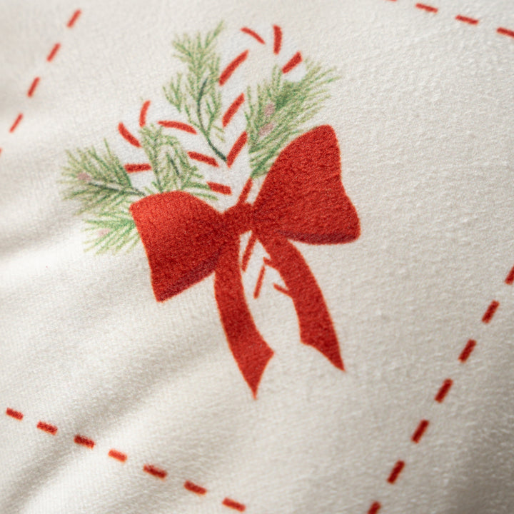 Rectangular decorative pillowcase with Christmas embroidery motifs and piping
