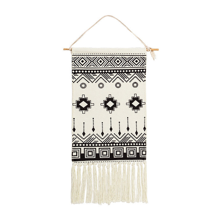 Woven cotton blend wall hanging with graphic ethnic pattern and long fringes
