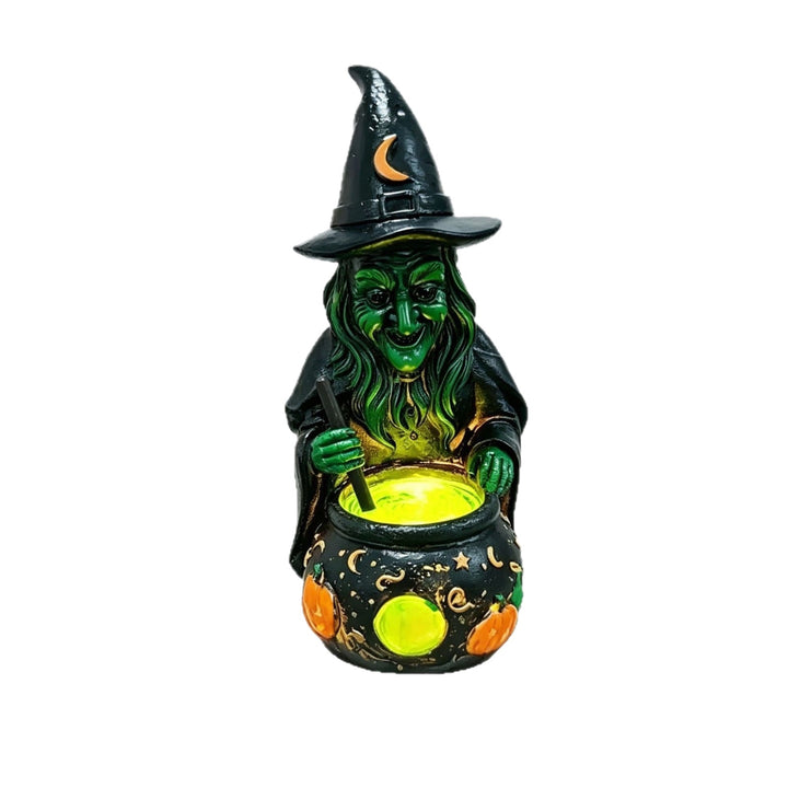 Decorative witch figure with cauldron