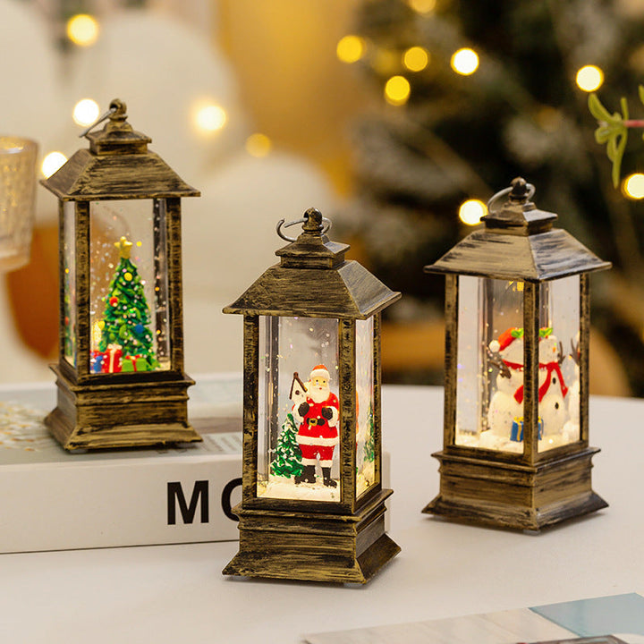 Christmas lantern with LED lighting and decorative snow effect