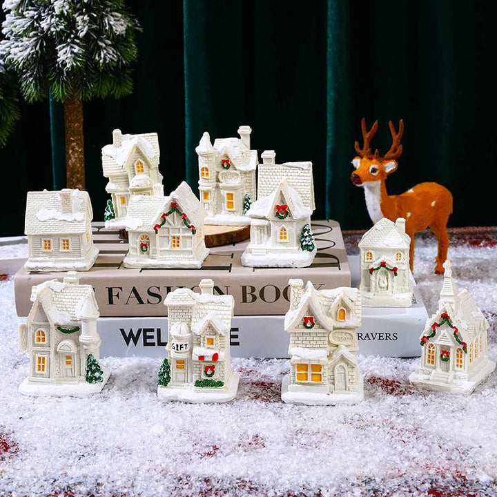 Illuminated Christmas village house with festive decoration