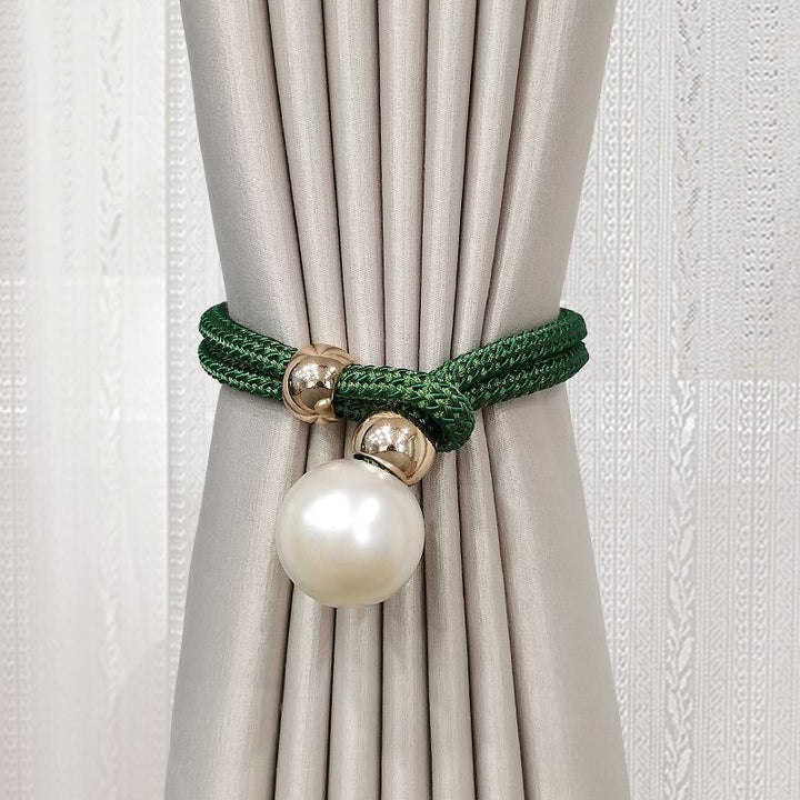 Elegant curtain tieback with decorative pearl