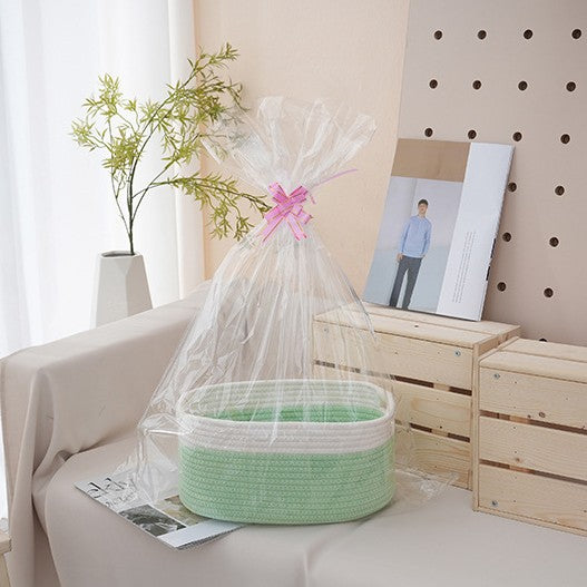 Natural storage basket with ribbons