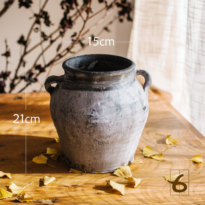 Rustic ceramic pot with handmade design