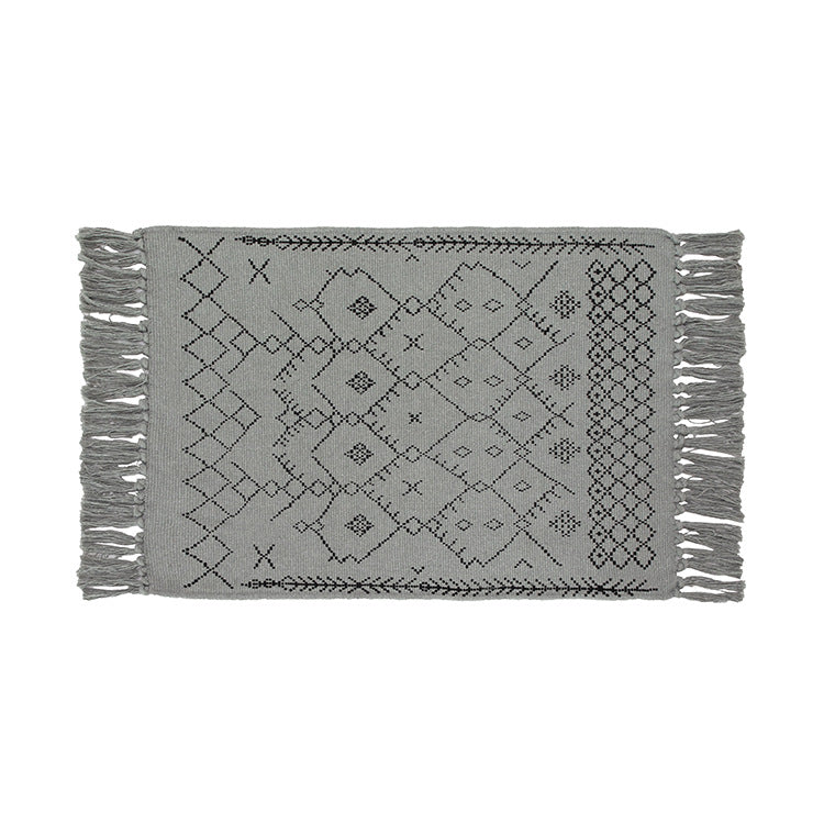Flat-woven entrance and living room rug with Moroccan diamond jacquard and decorative fringes