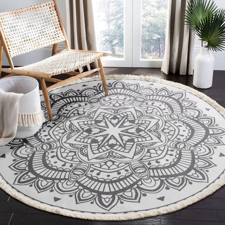 Round woven rug with mandala motif, flat cotton-jute mix and fringes