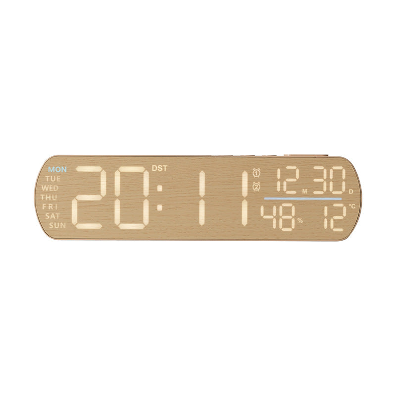 Digital alarm clock with temperature sensor and week display