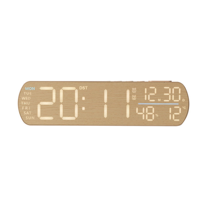 Digital alarm clock with temperature sensor and week display