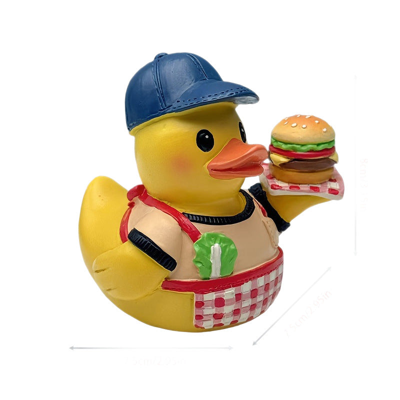 Funny rubber duck as grill master