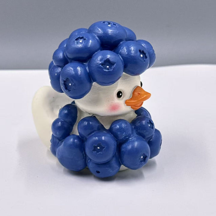 Decorative rubber duck with berry cocktail bowl