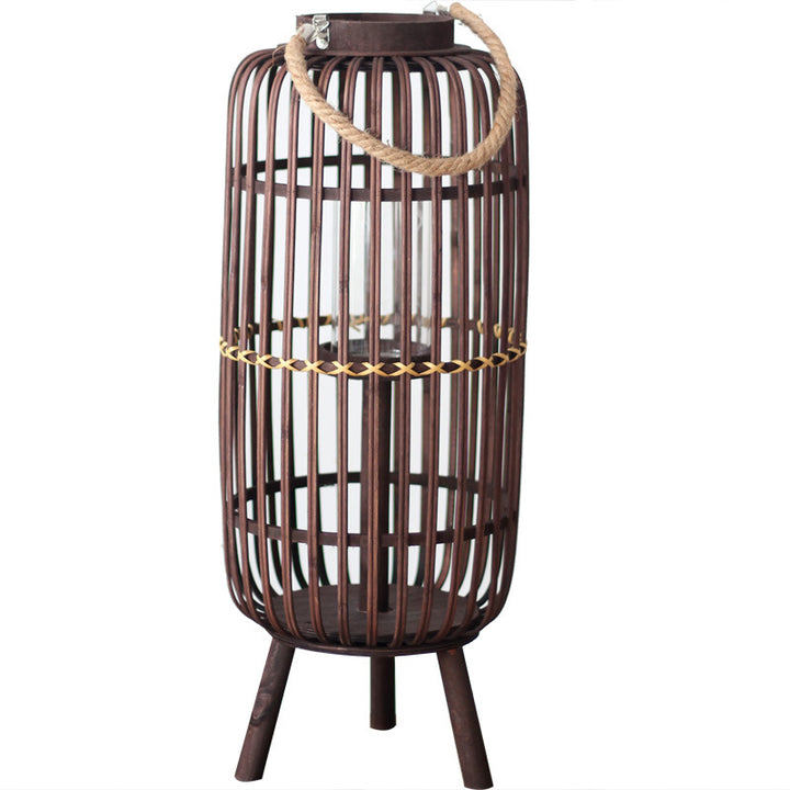 Stylish lantern made of rattan with wooden frame
