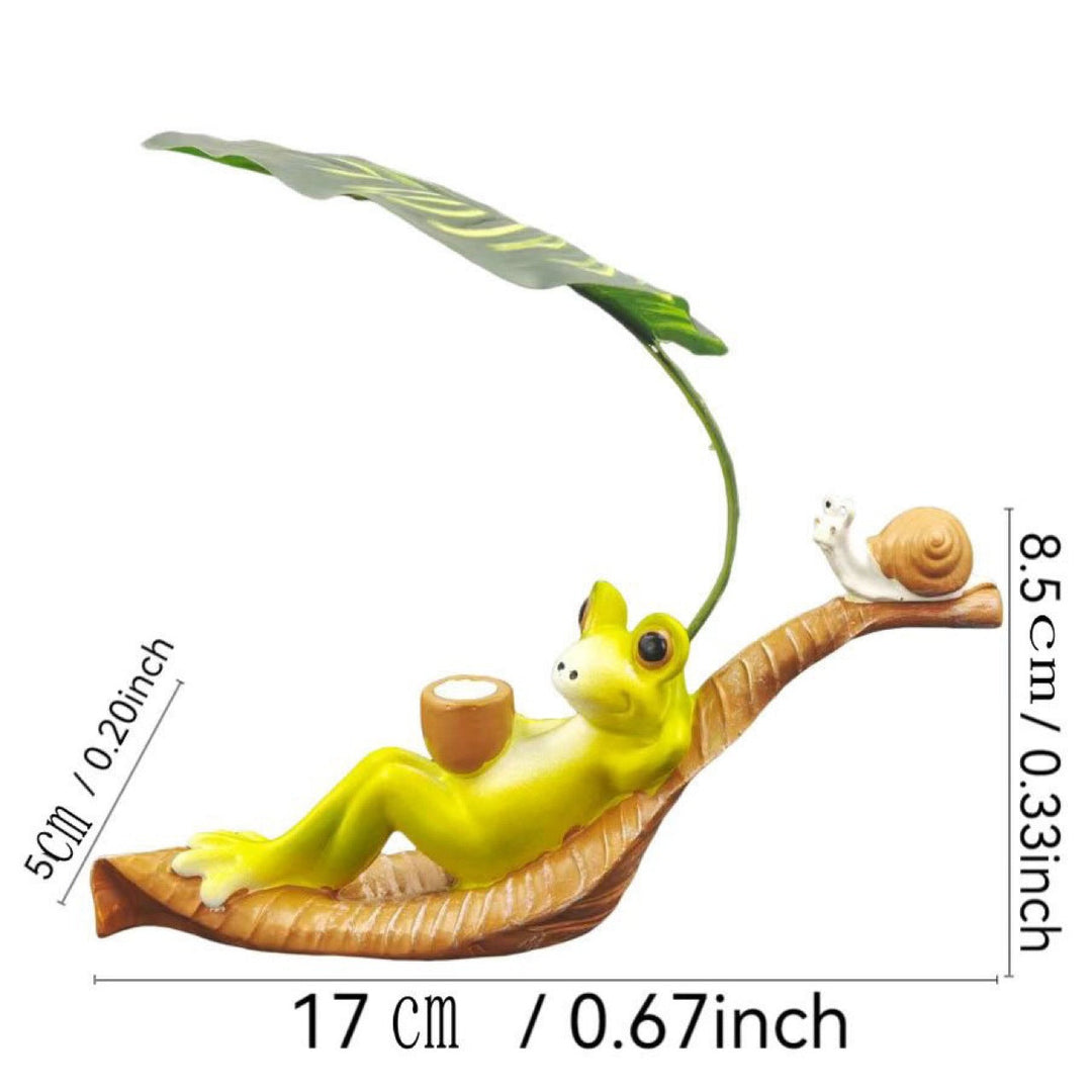 Funny frog figure with leaf decor