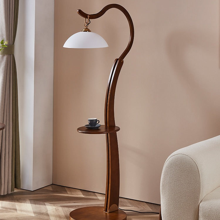 Artistic floor lamp with integrated side table