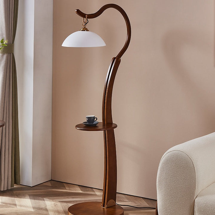 Artistic floor lamp with integrated side table