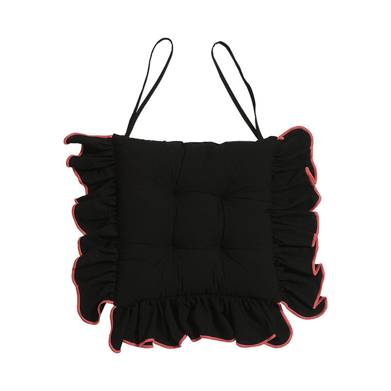 Padded chair cushion with ruffle and ties