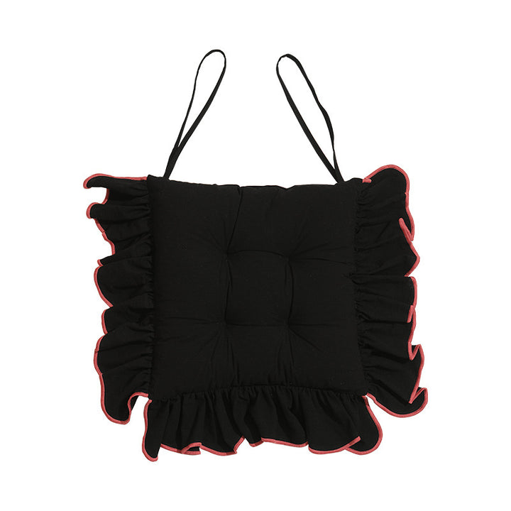 Padded chair cushion with ruffle and ties