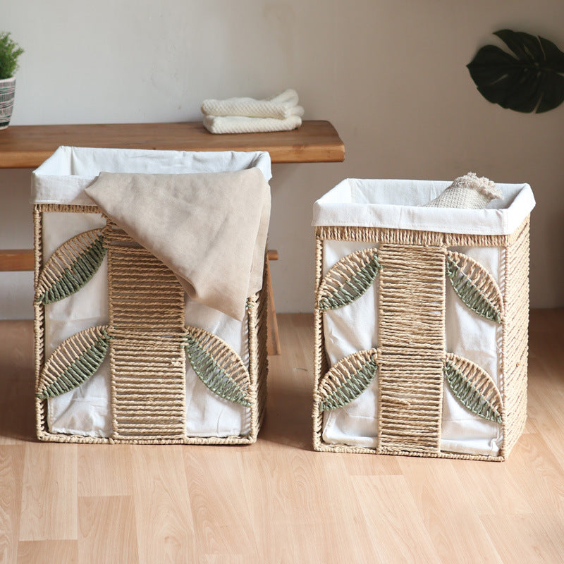 Elegant laundry basket made of natural wicker with fabric lining
