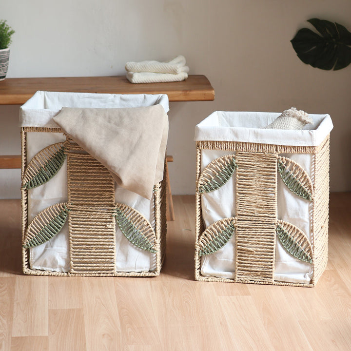 Elegant laundry basket made of natural wicker with fabric lining